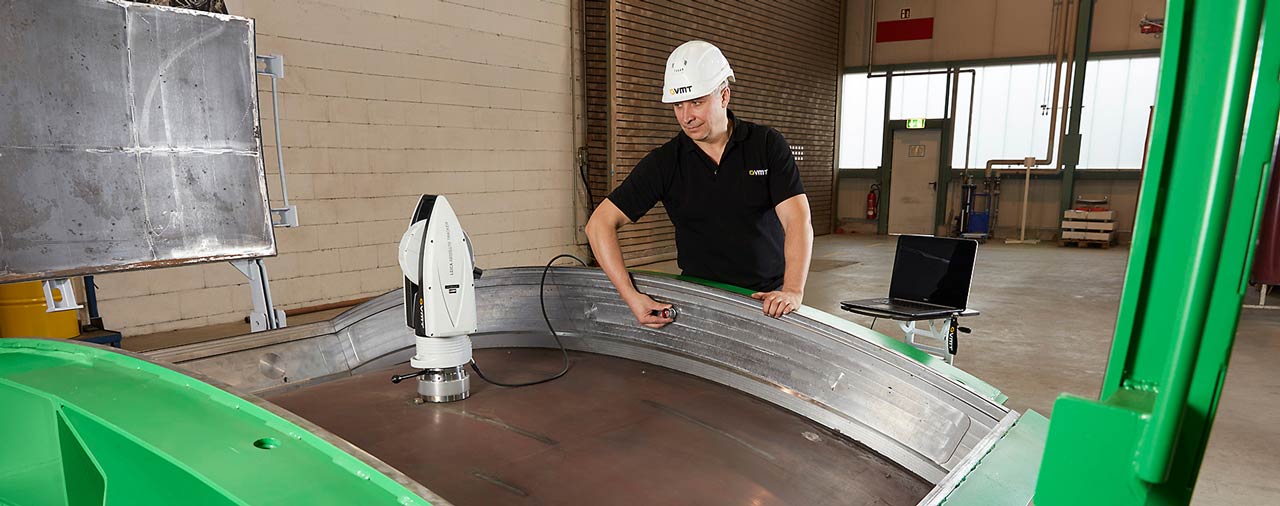 Worker checking a mold