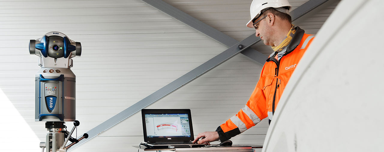 Worker checking data on a computer