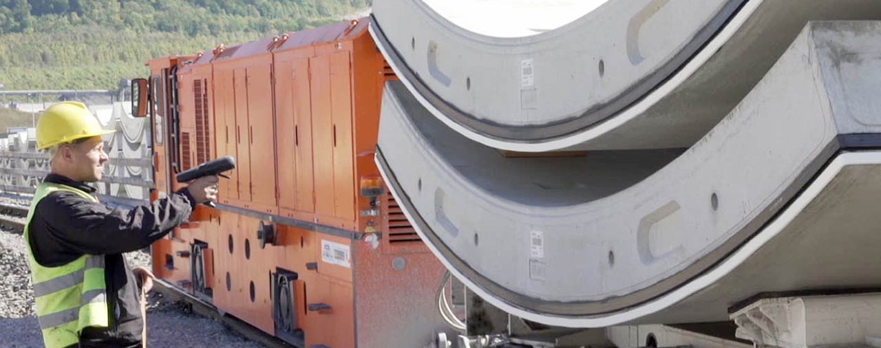 Worker scanning concrete elements