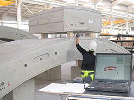 Worker checking concrete segments