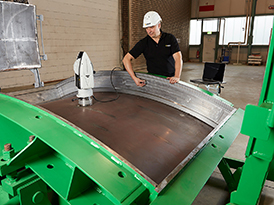 Worker checking a mold