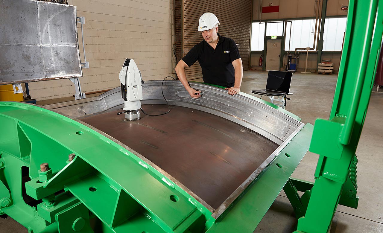 Worker checking a mold