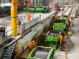 Workers checking molds