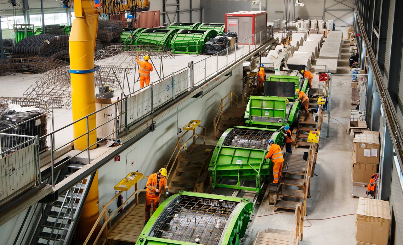 Workers checking molds